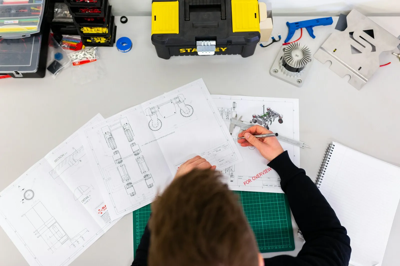 Industrial engineer reviewing equipment in the field